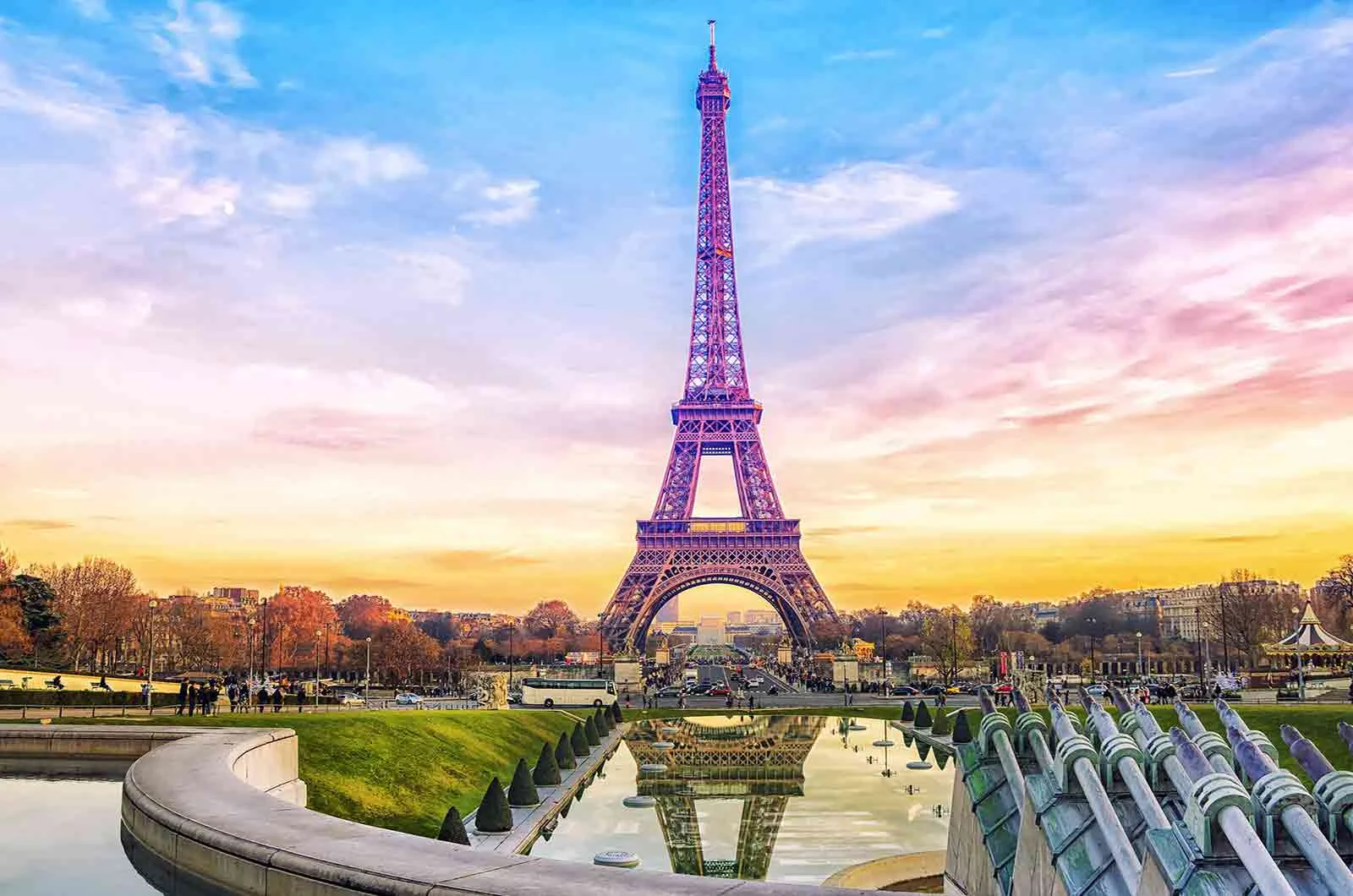 Trocadero Gardens and the Eiffel Tower at a beautiful sunset. Concept of French translation services and French translators.