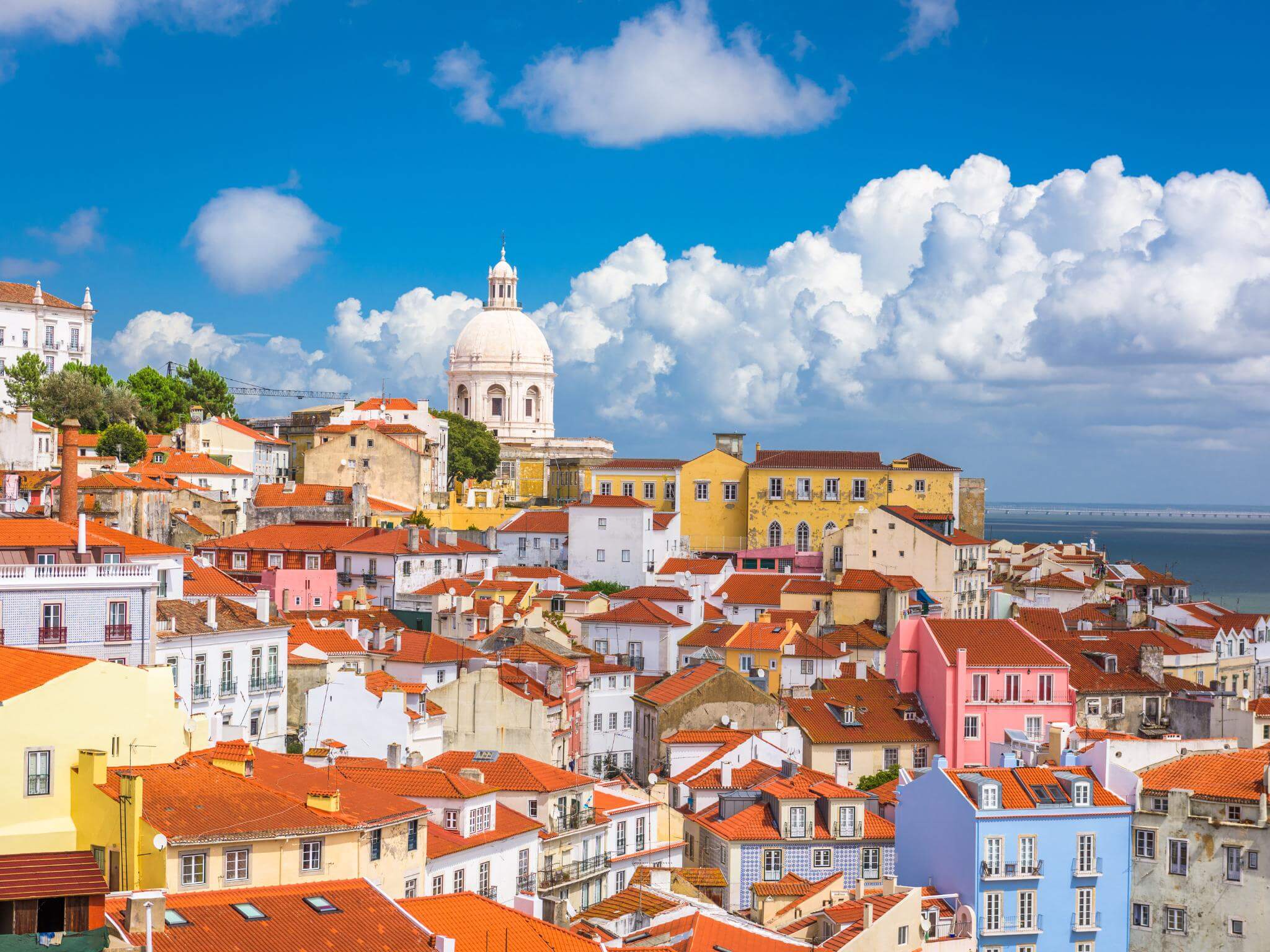 Traditional Rabelo boats on the Douro River in Porto, Portugal. Concept of Portuguese language history in Portugal and Brazil.