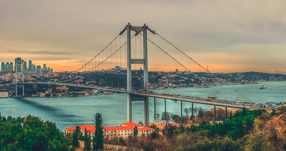 The 15 July Martyrs Bridge over the Bosphorus strait in Istanbul, Turkey. Concept of English Turkish translation services and professional Turkish translators.
