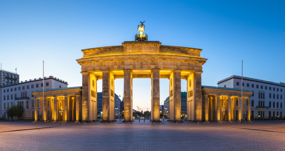 The Brandenburg Gate, a neoclassical monument in Berlin, Germany. Concept of German translation services by professional German translators.