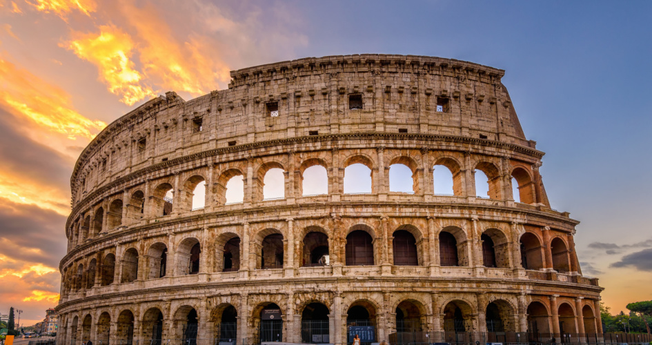 A sunset view of the Colosseum in Rome, Italy. Concept of Italian translation services by professional Italian translators.