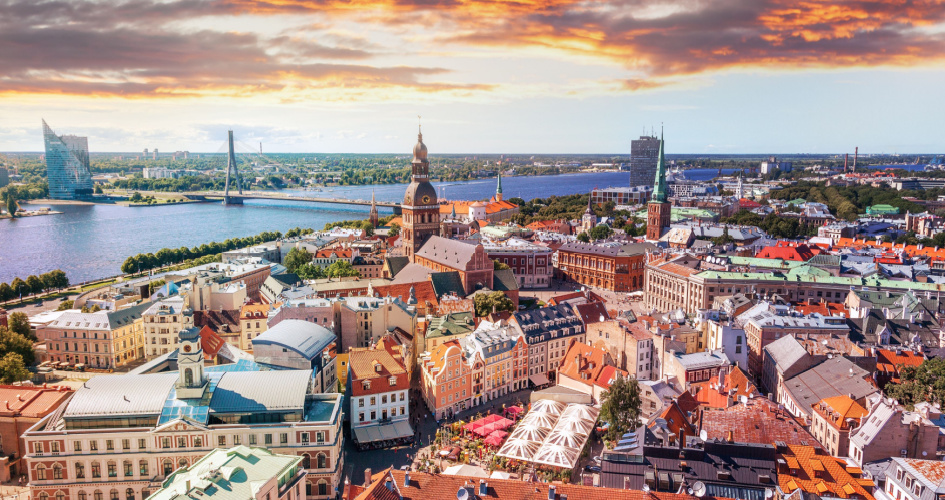 A bird's-eye view of Riga city, and the Western Dvina river. Concept of Latvian translation services and Latvian English translators.