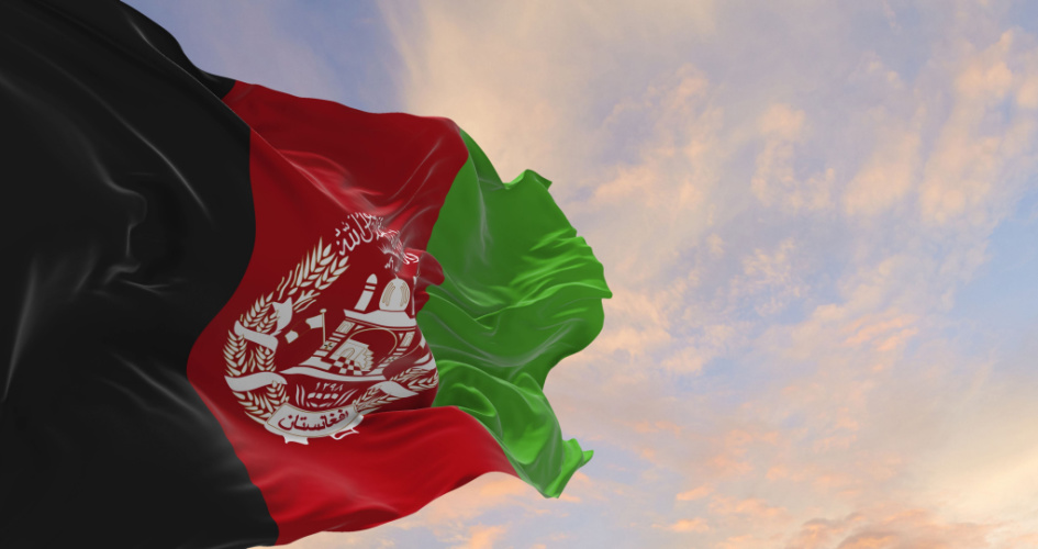 The black, red and green flag of Afghanistan. Concept of Dari translation services.