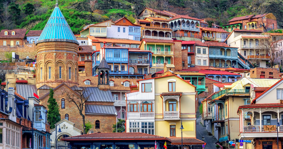 View of colourful traditional building in an old two in Tbilisi, Georgia. Concept of Georgian translation services.