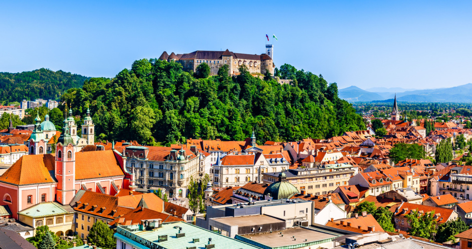 Panoramic view of the old town and the medieval Ljubljana castle in Slovenia. Concept of Slovenian translation services.