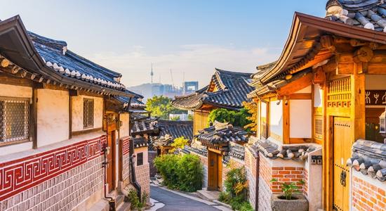 A street in Bukchon Hanok Village with traditional South Korean houses. Concept of Korean translation services.