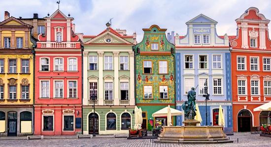 Merchants' Houses, a row of colourful buildings and a historical Polish landmark. Concept of Polish translation services.