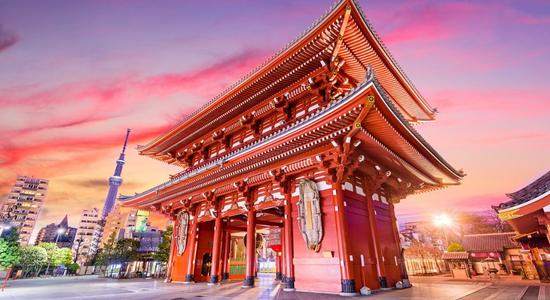 Sensō-ji, a red ancient Buddhist temple in Asakhusa, Tokyo. Concept of English to Japanese translation.