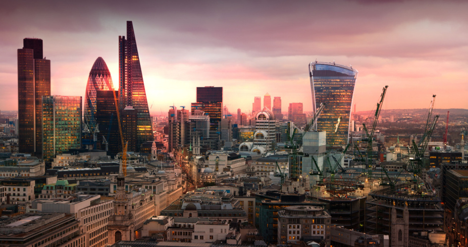The London skyline with several glass and steel skyscrapers at sunset. Concept of financial translation services by reliable financial translation company.
