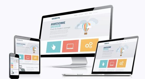 A phone, tablet, laptop, and monitor showing the same "Awesome Design" webpage. 